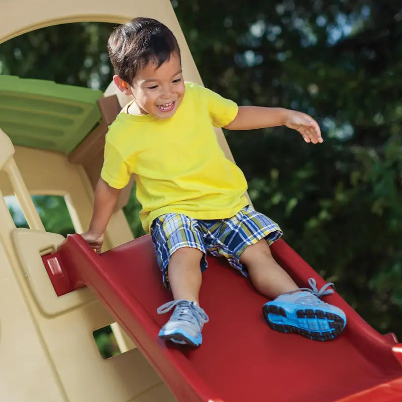 Step2 Neighborhood Fun Center – Outdoor Brown Plastic Playhouse with Slide for Kids